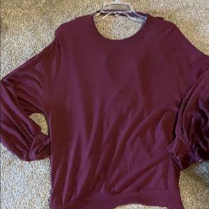 Lush sweater tunic with cut out on back